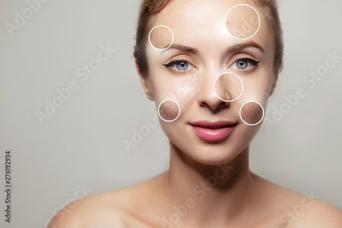 woman face portrait with clear and pimpled skin