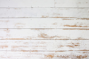 White wooden floorboards. Distressed worn floorboard background painted white