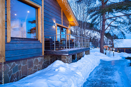 Winter country cottage. Chr...