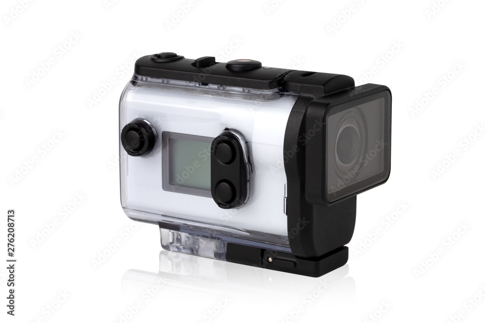Portable video camera on a white background. An action camera in a protective case close-up. Portable video camera on a white background. An action camera in a protective case close-up.