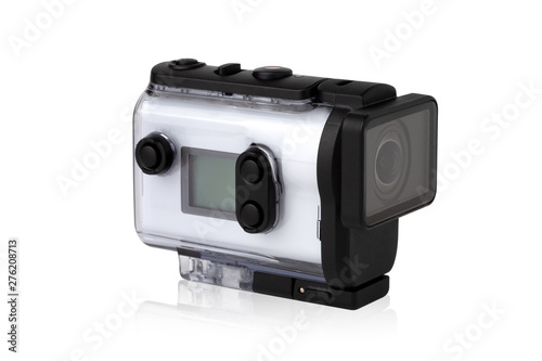 Portable video camera on a white background. An action camera in a protective case close-up.