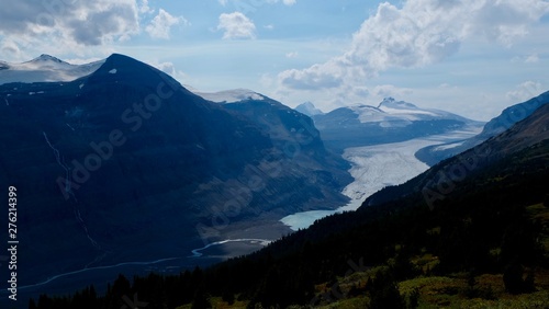 Fototapeta Naklejka Na Ścianę i Meble -  glacier in between snowcapped mountains