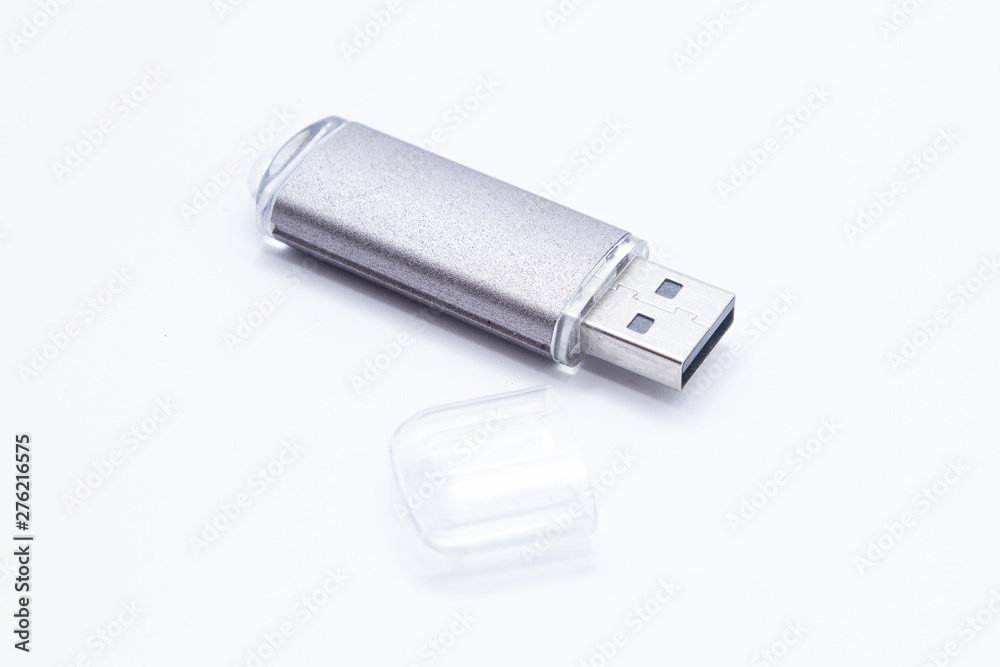 Flash drive isolated on a white background, closeup Flash drive isolated on a white background, closeup