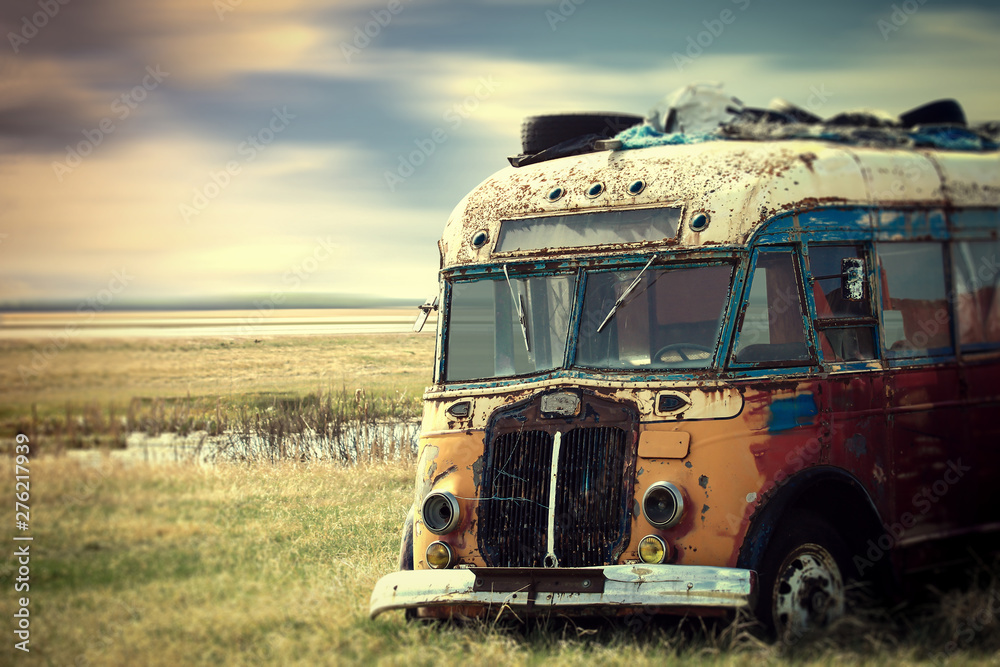 Brightly colored vintage hippy van parked in the countryside - obrazy, fototapety, plakaty 