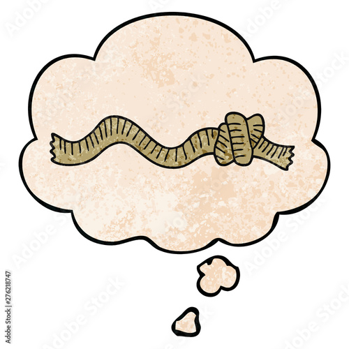cartoon knotted rope and thought bubble in grunge texture pattern style