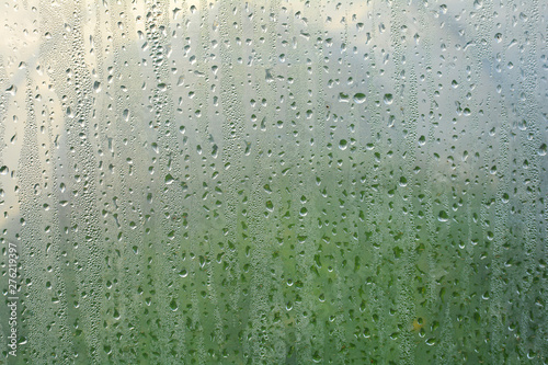 macro texture water drops. Many small drops of water on plastic film.