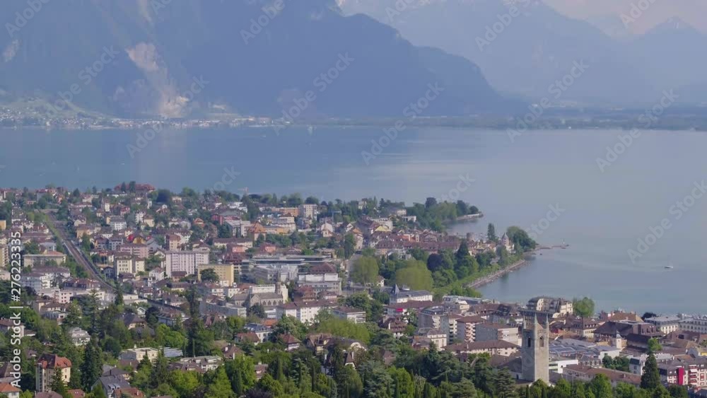 Aerial shot over Vevey city, camera tilting up revealing Lake Leman and Montreux Aerial shot over Vevey city, camera tilting up revealing Lake Leman and Montreux