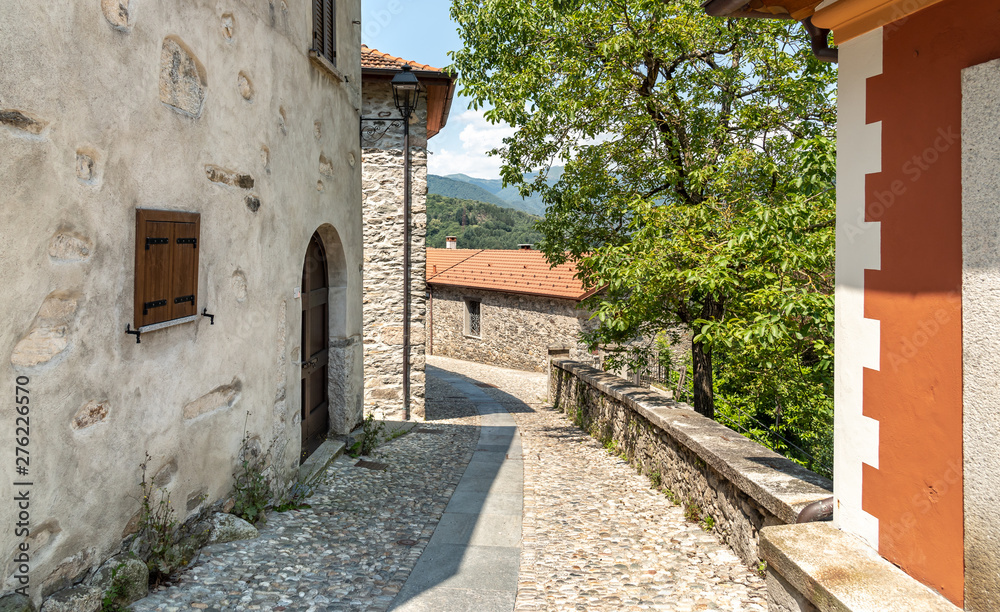 Narrow streets wit stone houses in the small mountain village of
