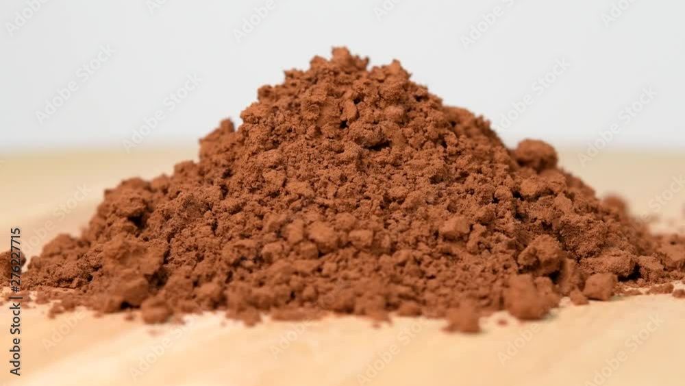 Pile of cocoa powder rotating