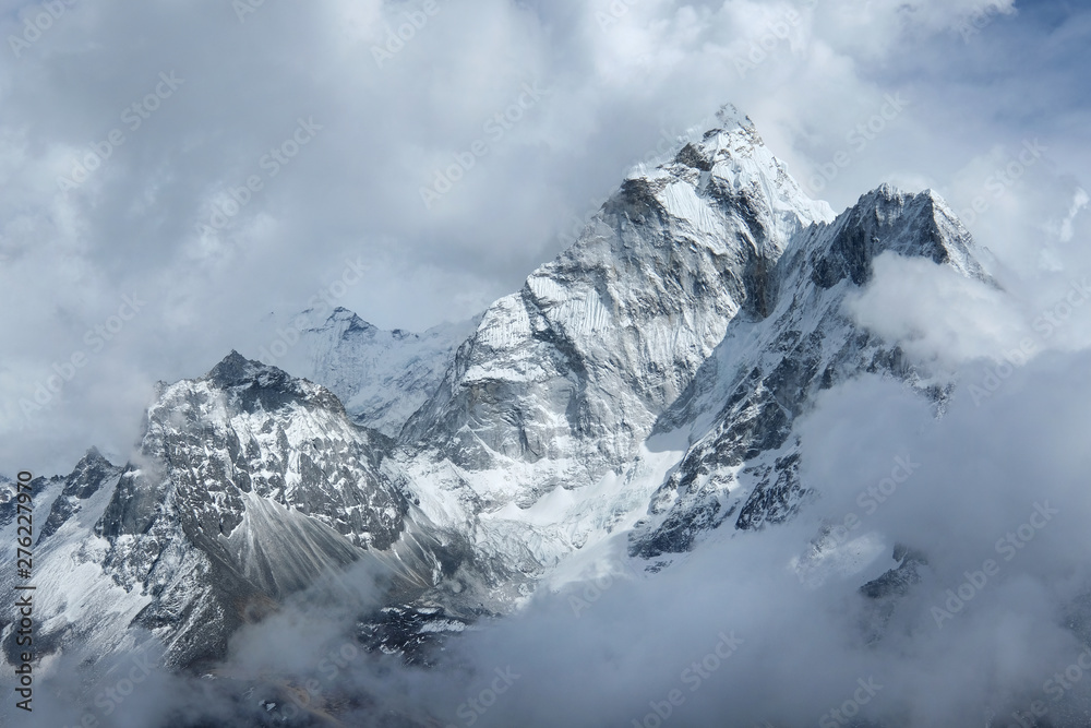 Obraz premium View of fogy Ama Dablam in the clouds on the way to Everest Base Camp, Nepal
