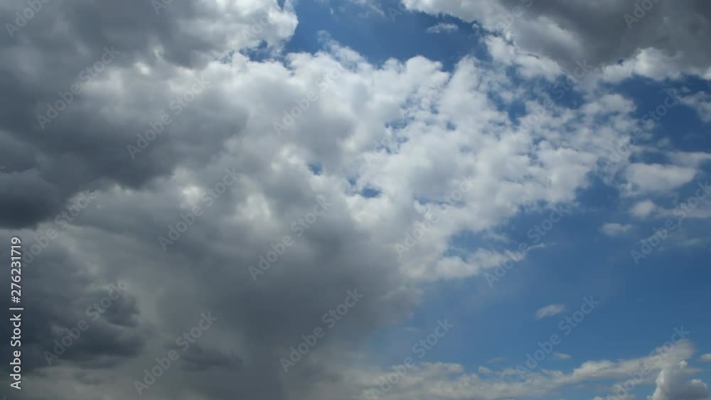 Moving dramatic storm clouds with blue sky Moving dramatic storm clouds with blue sky