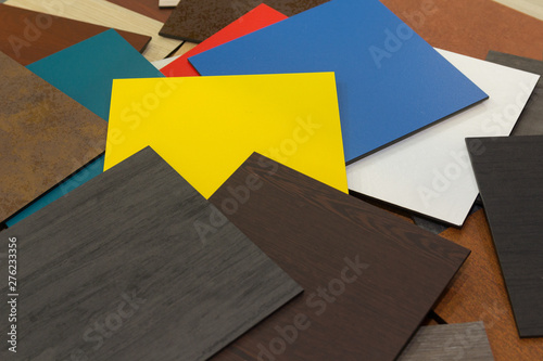 Multi-colored samples of composite materials for the ventilated facades in showroom. Construction