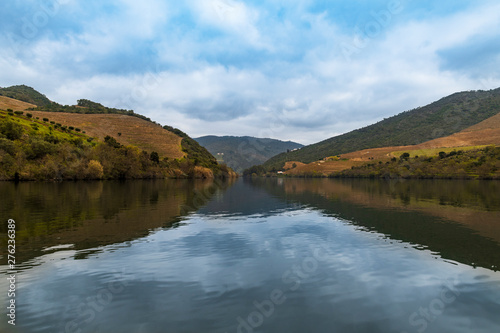 Scenic view of the Douro River and Valley with terraced vineyards, in Portugal  Concept for travel in Portugal and most beautiful places in Portugal © Tiago Fernandez
