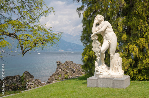 BELAGGIO  ITALY - MAY 10  2015  The statue of Apollo in gardens of Villa Melzi by G. Della Porta from 16. cent.