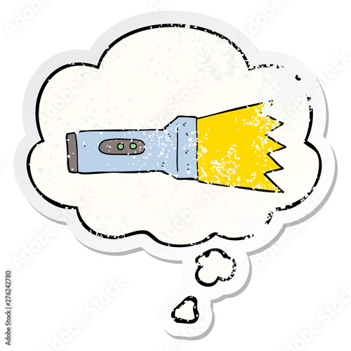 cartoon torch and thought bubble as a distressed worn sticker
