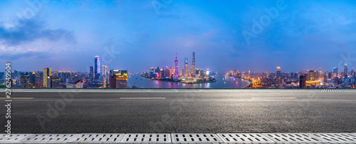 Photography Shanghai skyline panoramic view with asphalt highway at night,China