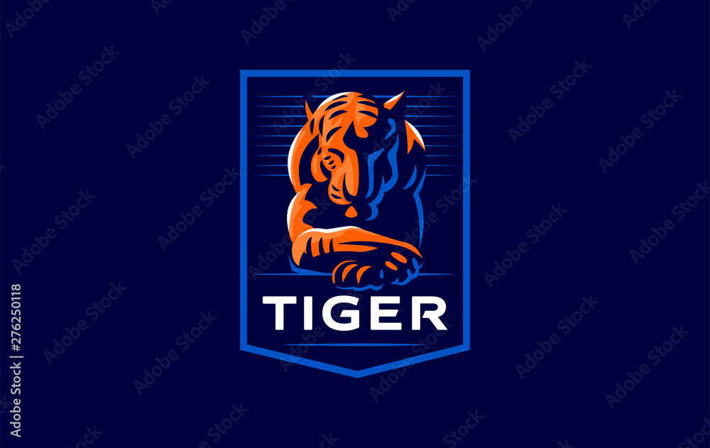 A tiger lies with its head down A tiger lies with its head down