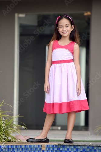 Cute Teenage Female Wearing Dress © dtiberio
