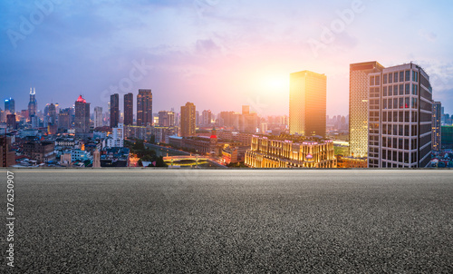 Shanghai skyline panoramic view with asphalt highway at sunset
