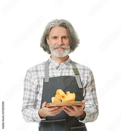 Male owner of cheese store ...
