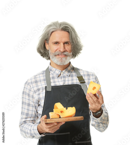 Male owner of cheese store ...