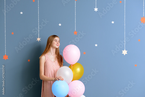 Cute teenage girl with air ...