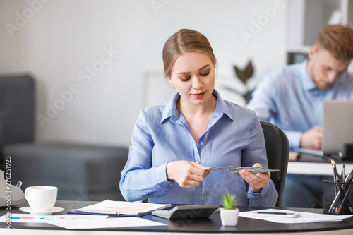Female accountant working in office