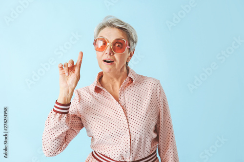 Mature woman with raised in...