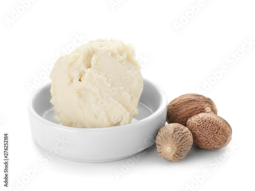 Plate with shea butter on white background