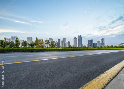 empty asphalt road with city skyline background in china. © hallojulie