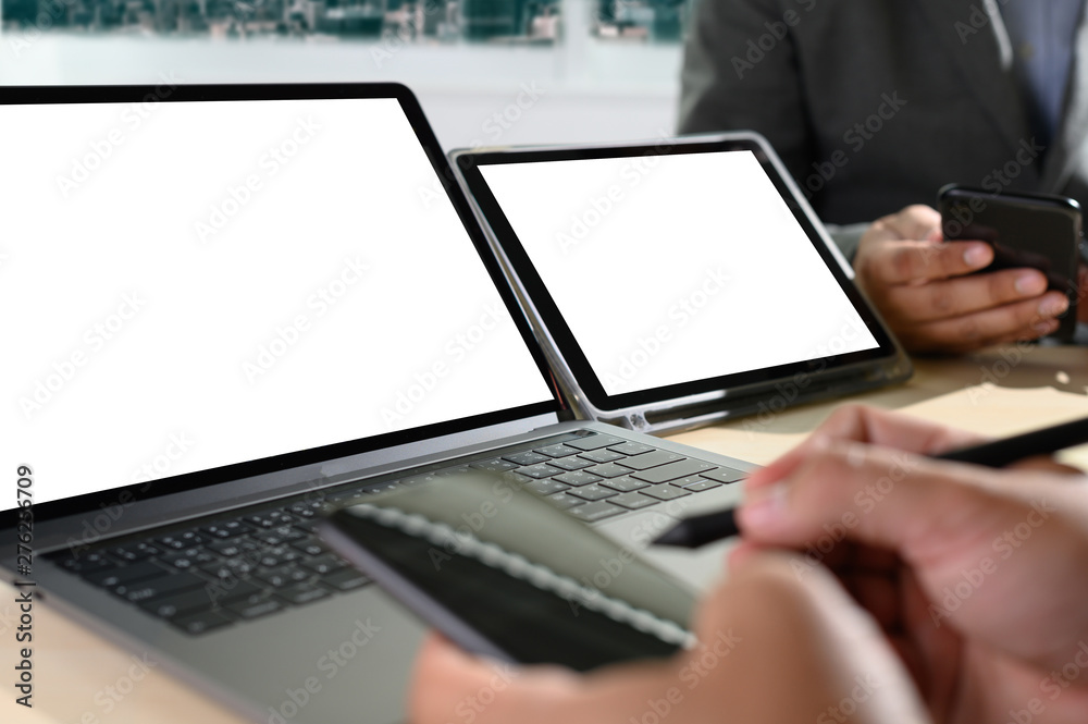 Laptop with blank screen on table. Workspace background new project on laptop computer with blank copy space screen for your advertising text message Laptop with blank screen on table. Workspace background new project on laptop computer with blank copy space screen for your advertising text message