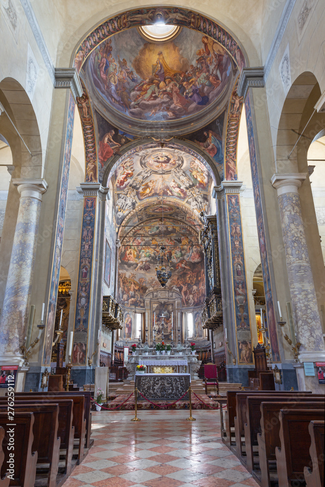 REGGIO EMILIA, ITALY - APRIL 12, 2018: The church Basilica di San Prospero with the Last Judgment fresco in main apsida of by Camillo Procaccini (1585 - 1587).