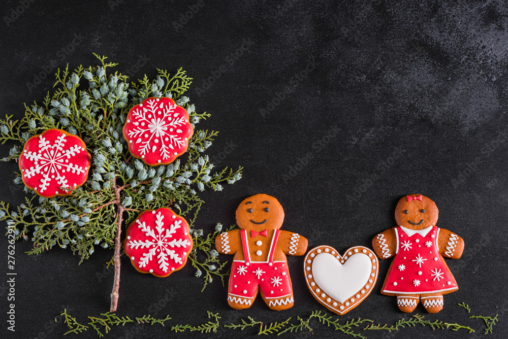 Christmas homemade gingerbread cookies on a dark background