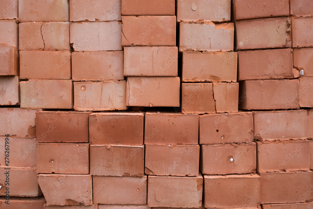Obraz premium The piled red bricks