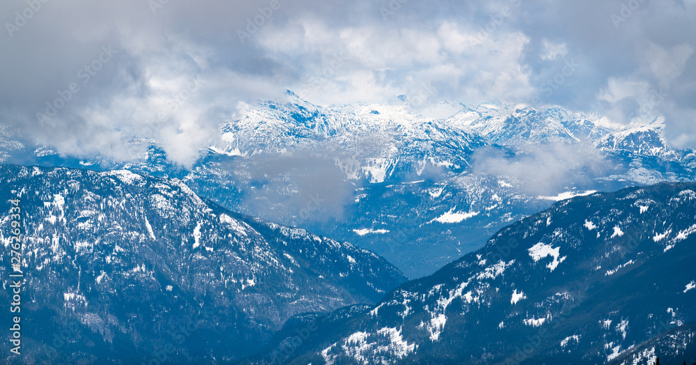 Snowy Mountain in the Clouds