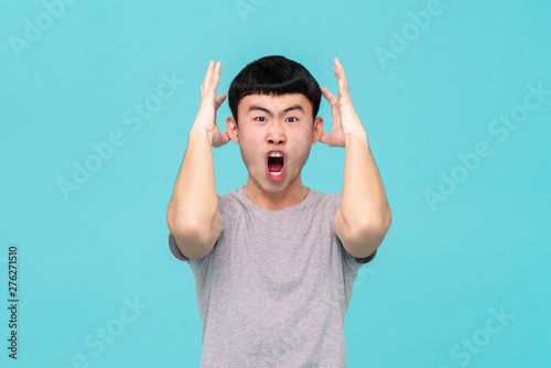 Photography Aggressive angry young Asian man shouting