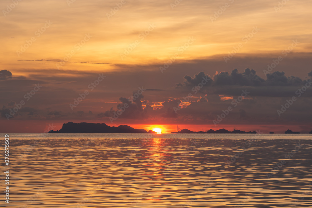 Beautiful tropical beach sunset with golden lights background,Koh Samui Thailand