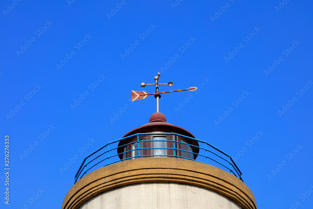 Lighthouse close-up in the sky