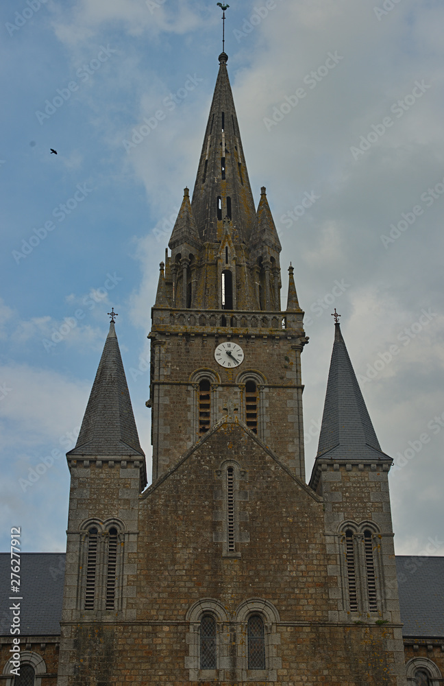 Big old stone Catholic cathedral in Sourdeval Normandy France Big old stone Catholic cathedral in Sourdeval Normandy France