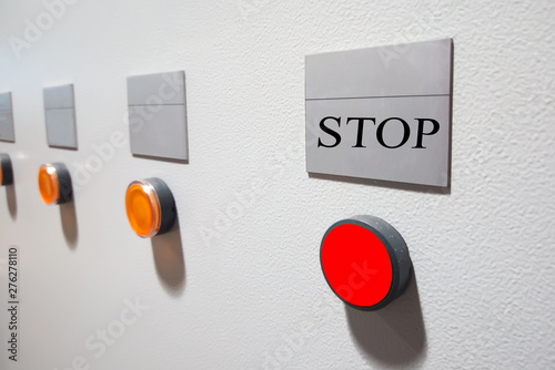 Red emergency button. Inscription 