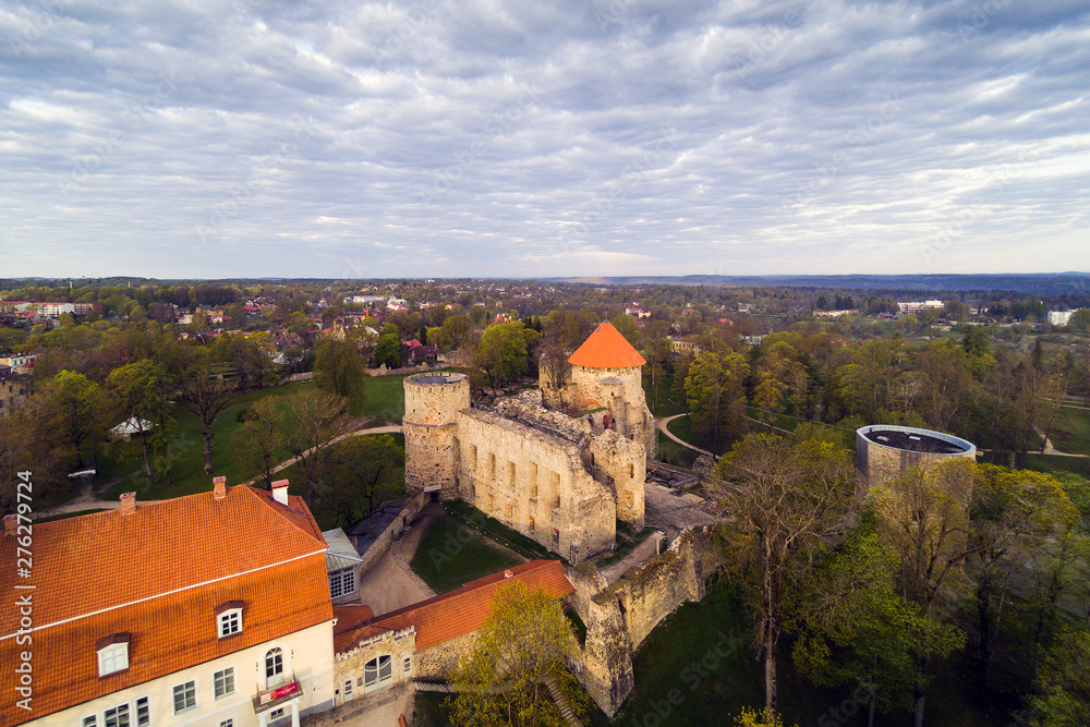 Cesis castle and park in morning light, Latvia.