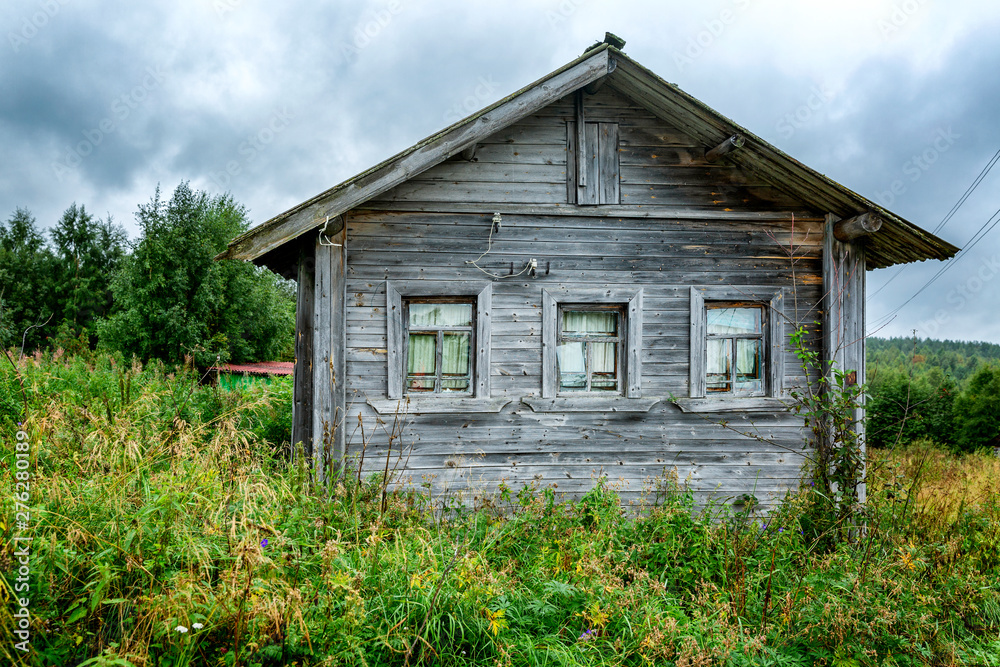 Old wooden house by the river. Beautiful landscape. Old wooden house by the river. Beautiful landscape.