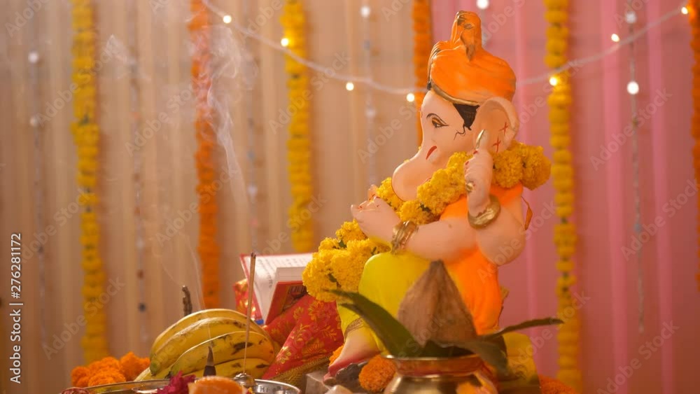 Side closeup of Lord Ganesha's statue kept at home Ganesh Chaturthi