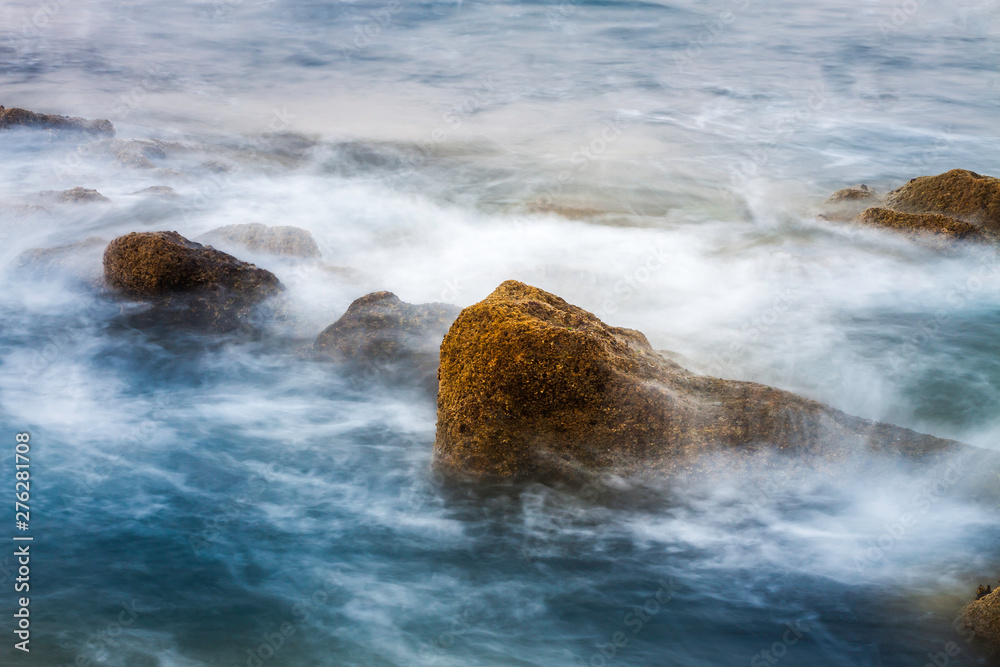 SEA WAVES REVOLTED ON THE ROCKS ON THE NORTHERN COAST OF SPAIN SEA WAVES REVOLTED ON THE ROCKS ON THE NORTHERN COAST OF SPAIN