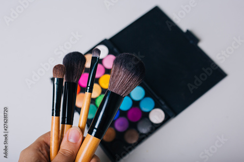 Bright shadows and make-up brushes. Beauty and Fashion