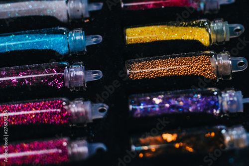 Small jars with sequins for manicure