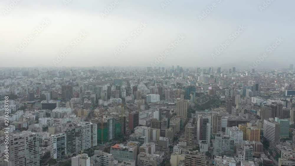 Aerial view of heavy city in Lima, Peru. 4K drone tilt down towards buidings. Aerial view of heavy city in Lima, Peru. 4K drone tilt down towards buidings.