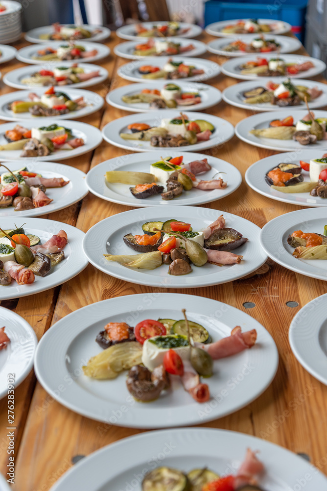 plates with antipasti appetizers plates with antipasti appetizers