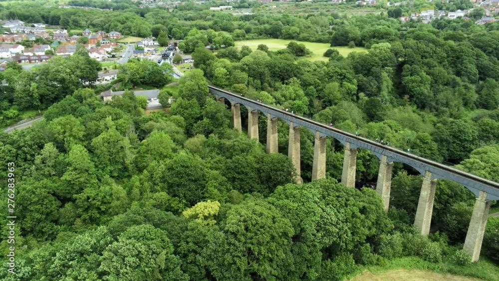 Pontcysyllte Aqueduct arch bridge canal waterway crossing. High altitude aerial view across structure landscape. Pontcysyllte Aqueduct arch bridge canal waterway crossing. High altitude aerial view across structure landscape.