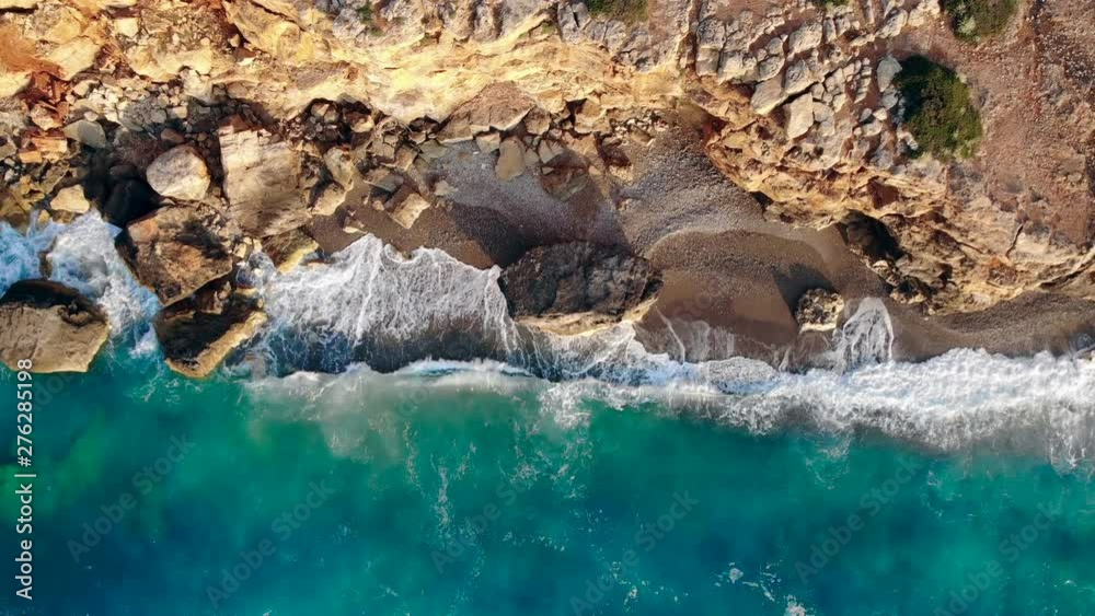 Aerial view of a blue sea and cliffs. Ocean shore, wild nature concept. Aerial view of a blue sea and cliffs. Ocean shore, wild nature concept.